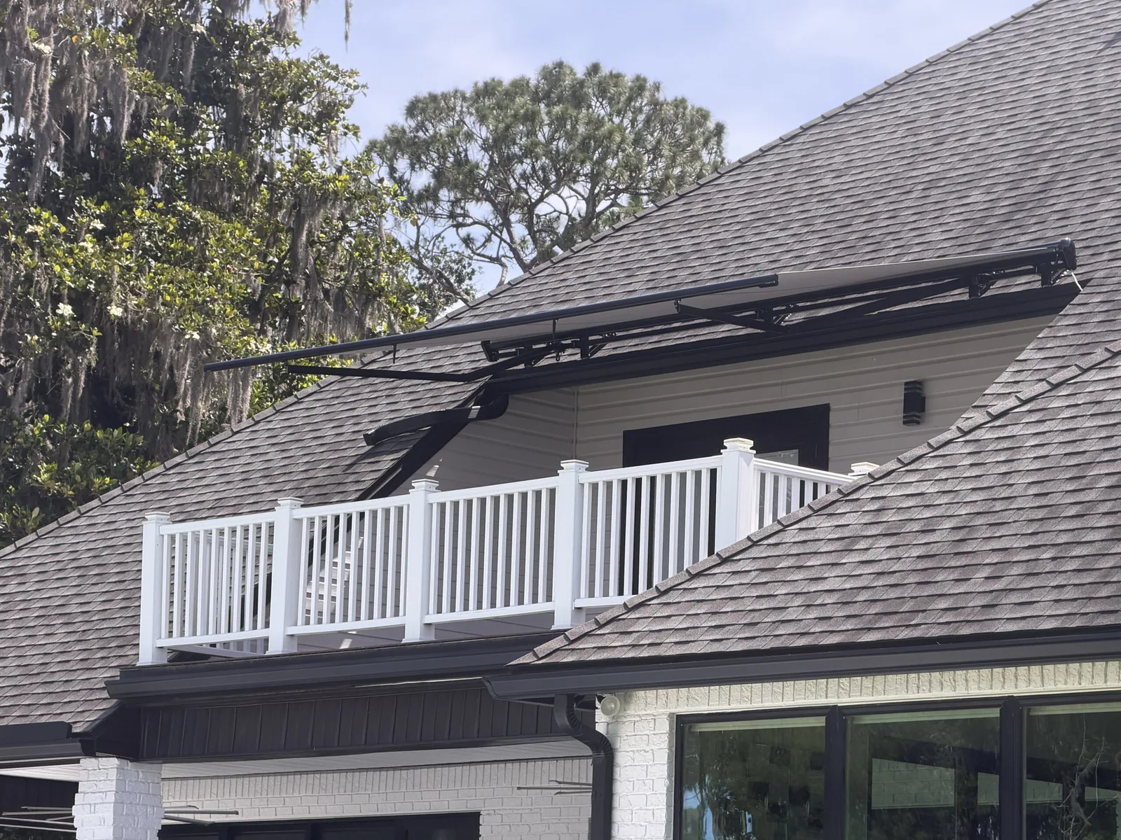 Motorized Retractable Awning, Custom Roof-Bracket Mount — photo 2 in Fruit Cove, FL