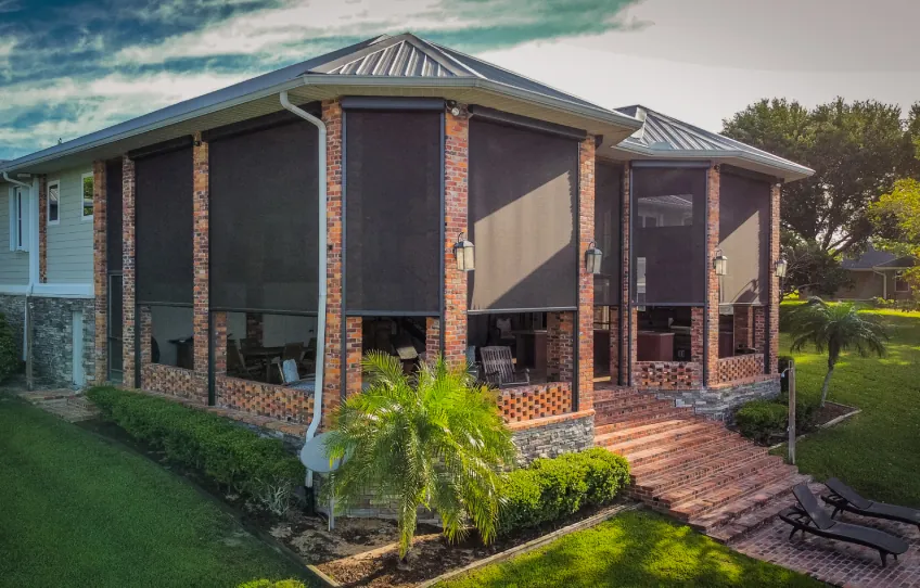 Motorized solar screens on a residential exterior near St. Augustine Beach, FL