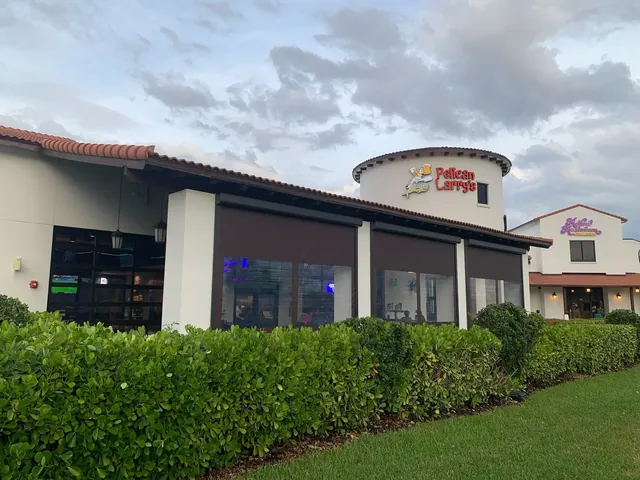 Brown commercial vinyl screens enclosing a restaurant patio