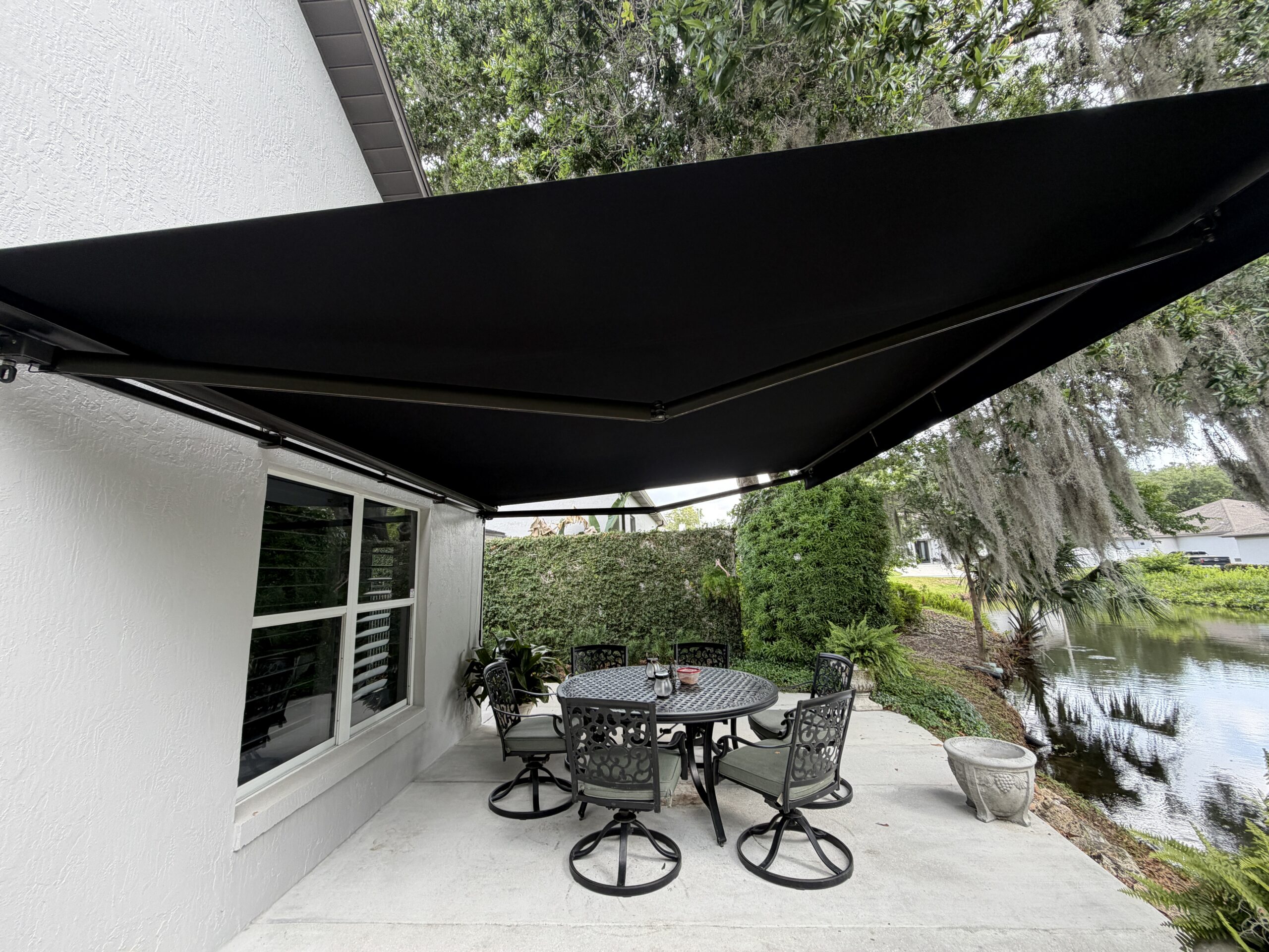 16 by 12 foot motorized retractable awning installed in Ocala, FL